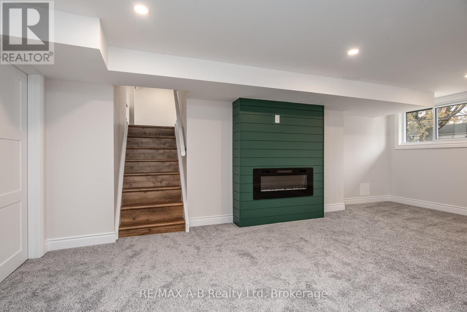 149 Norfolk Street, Stratford, ON - Indoor With Fireplace