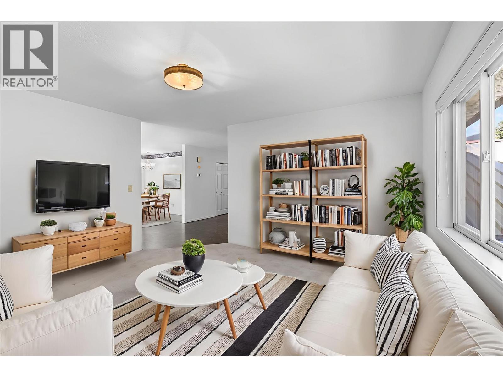 Photo has been Digitally Staged for Perspective - 329 6Th Ave S Avenue, Creston, BC - Indoor Photo Showing Living Room