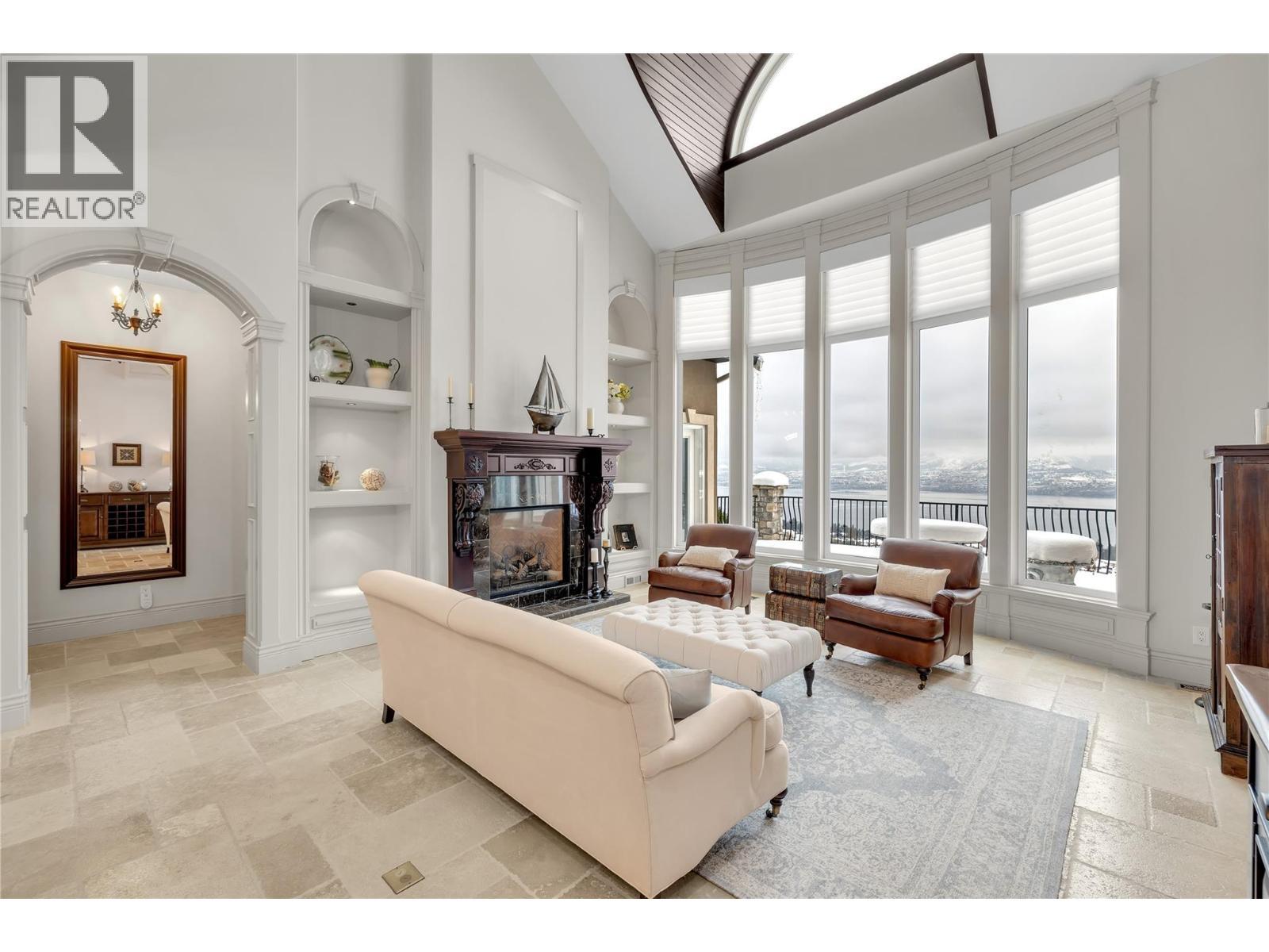 714 Kuipers Crescent, Kelowna, BC - Indoor Photo Showing Living Room With Fireplace