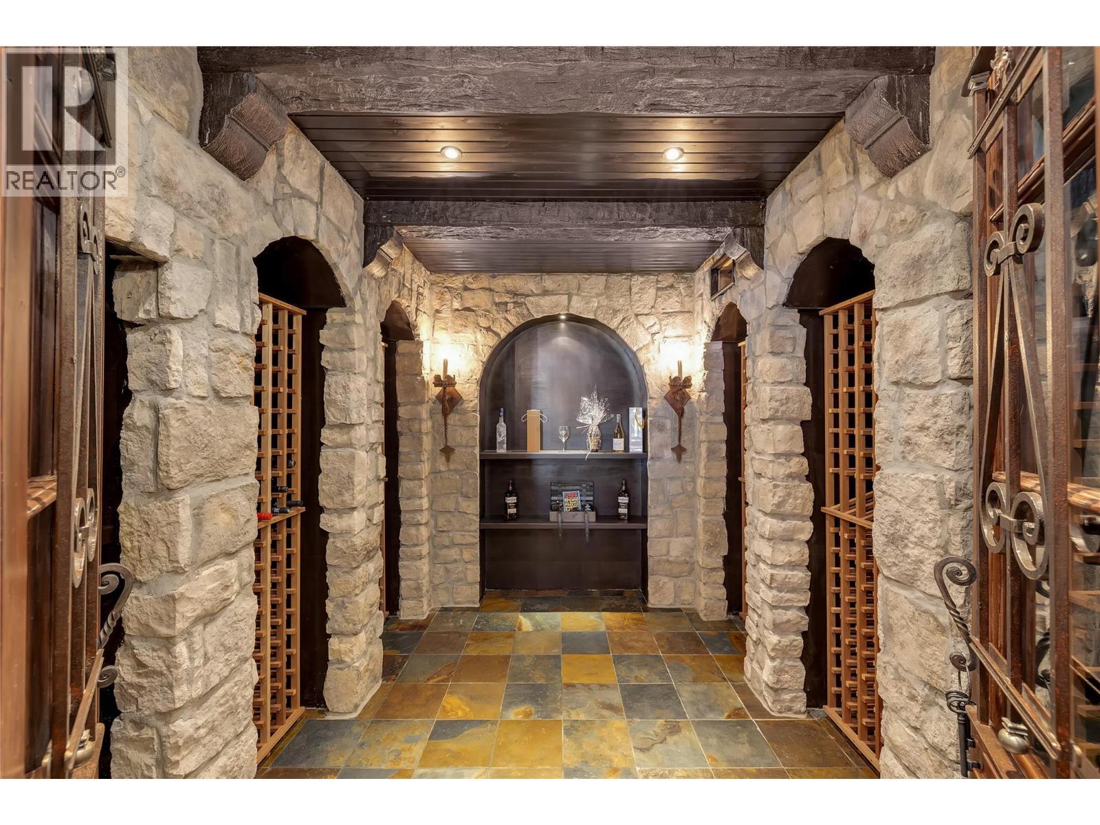 714 Kuipers Crescent, Kelowna, BC - Indoor Photo Showing Other Room With Fireplace
