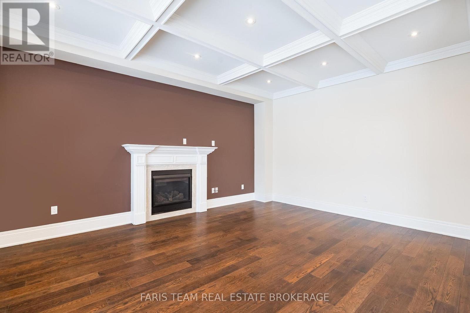 27 Marks Road, Springwater, ON - Indoor Photo Showing Other Room With Fireplace