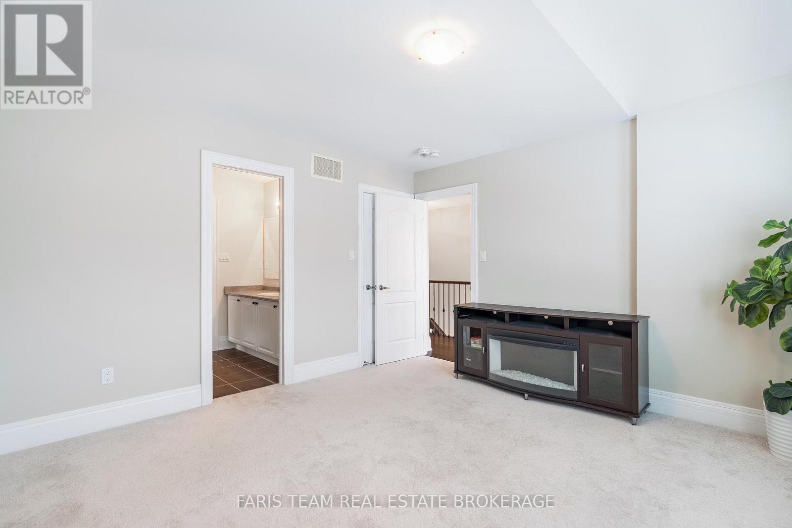 27 Marks Road, Springwater, ON - Indoor Photo Showing Other Room