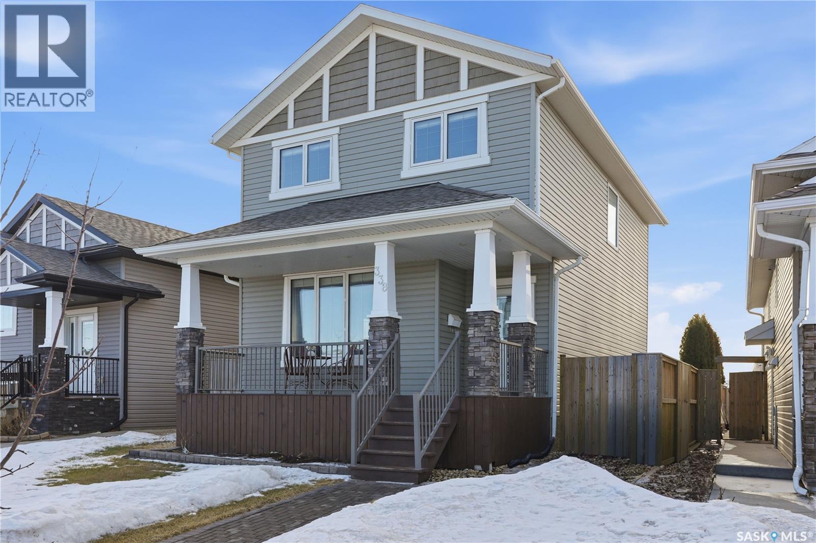 338 Rosewood Boulevard W, Saskatoon, SK - Outdoor With Deck Patio Veranda With Facade