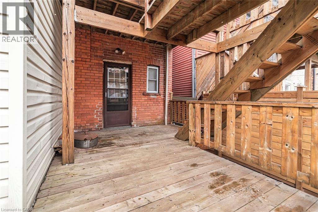 View of wooden deck - 57 New Street, Hamilton, ON - Photo Showing Other Room