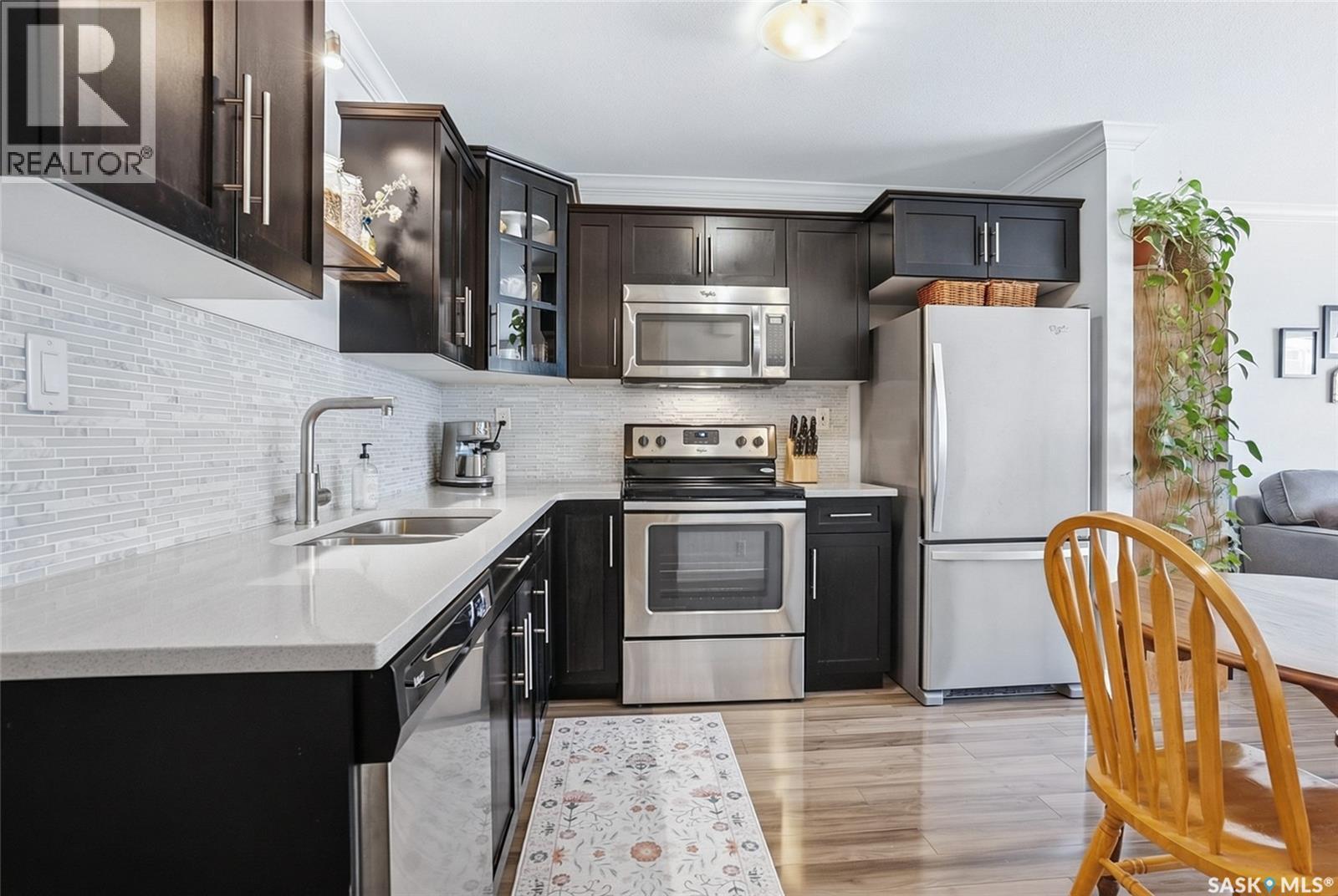 343 620 Cornish Road, Saskatoon, SK - Indoor Photo Showing Kitchen With Stainless Steel Kitchen With Double Sink With Upgraded Kitchen
