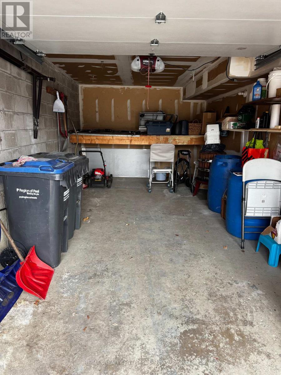 Single Car Garage with EGDO - 100 Antigua Road, Mississauga, ON - Indoor Photo Showing Other Room