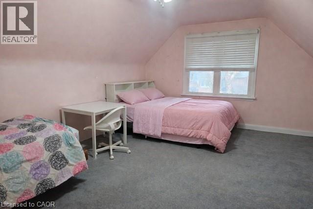Bedroom with carpet flooring and a ceiling fan - 226 Auburn Avenue, Hamilton, ON - Indoor Photo Showing Bedroom