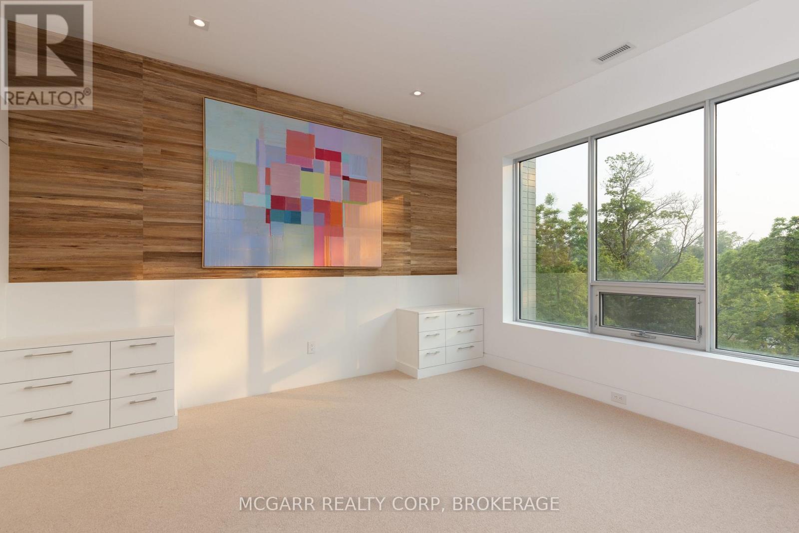Primary suite - 401 - 77 Yates Street, St. Catharines (Downtown), ON - Indoor Photo Showing Other Room