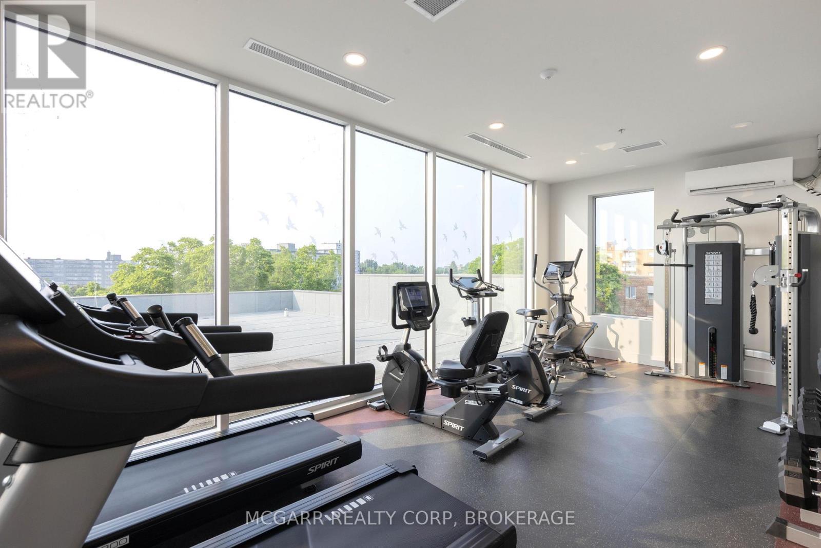 Amazing exercise room - 401 - 77 Yates Street, St. Catharines (Downtown), ON - Indoor Photo Showing Gym Room