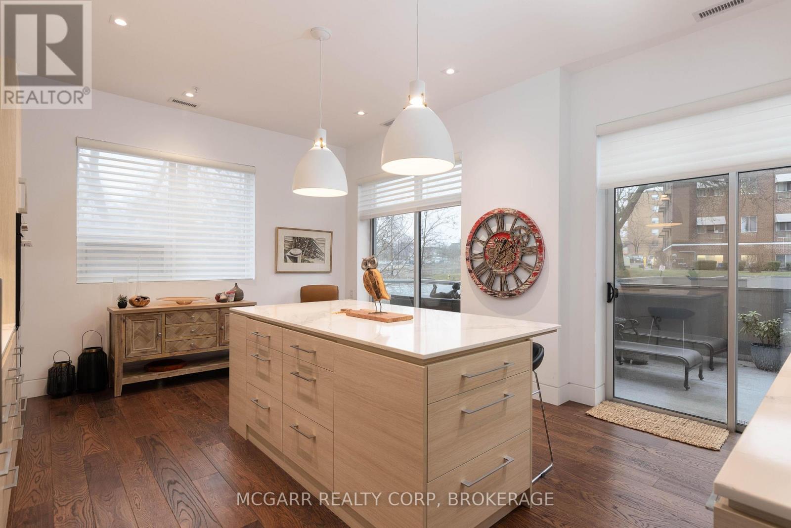 Patio doors to \"one of a kind\" east facing terrace - 401 - 77 Yates Street, St. Catharines (Downtown), ON - Indoor