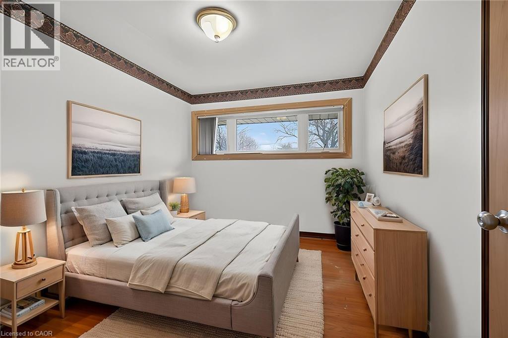 virtually staged - 19 Burfield Avenue, Hamilton, ON - Indoor Photo Showing Bedroom