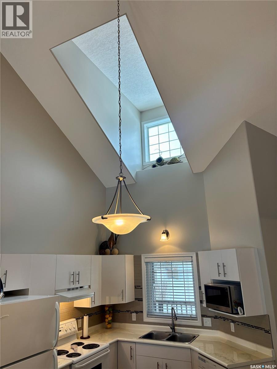 66 Eagle View Way, Elk Ridge, SK - Indoor Photo Showing Kitchen With Double Sink