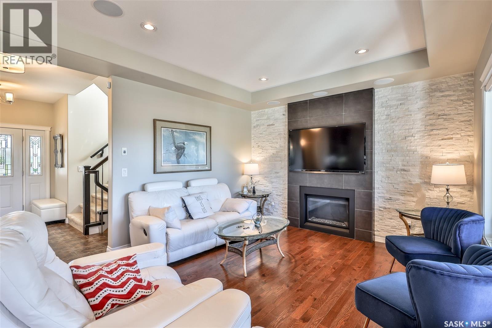 200 Clubhouse Boulevard E, Warman, SK - Indoor Photo Showing Living Room With Fireplace