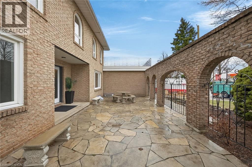 View of patio / terrace featuring a gate - 22 Woodside Drive, Hamilton, ON - Outdoor