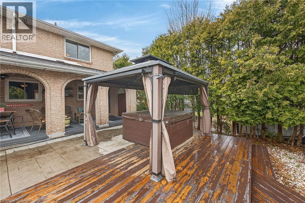 Wooden terrace featuring a gazebo, a patio, and a hot tub - 22 Woodside Drive, Hamilton, ON - Outdoor With Deck Patio Veranda