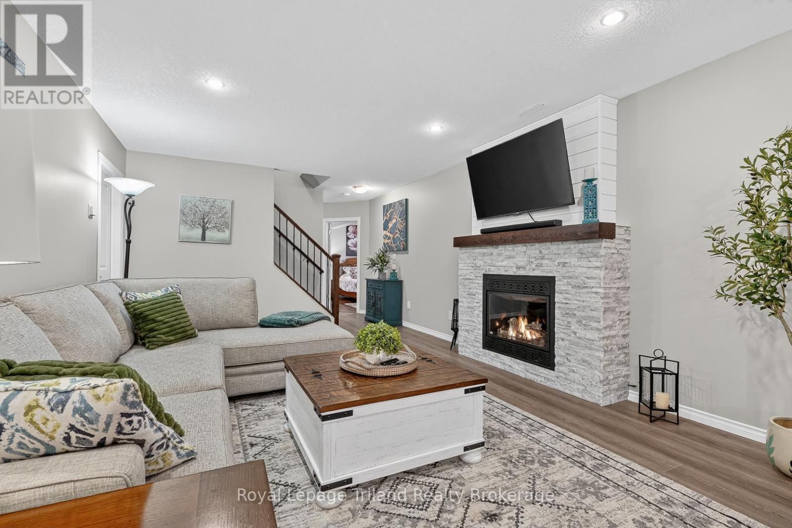 Family Room - 46 Colin Avenue, Tillsonburg, ON - Indoor Photo Showing Living Room With Fireplace
