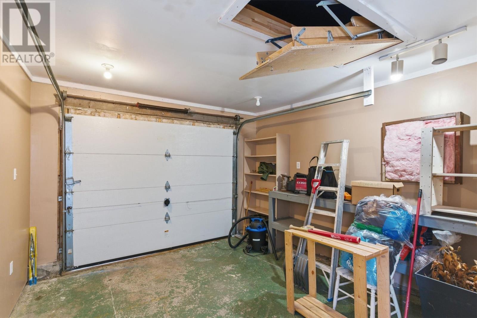 67 Jr Smallwood Boulevard, Gambo, NL - Indoor Photo Showing Garage