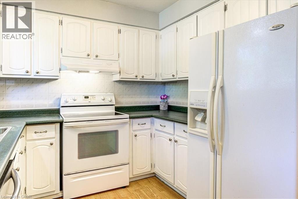 Nice and bright with lots of storage. - 12 Miller Crescent, Simcoe, ON - Indoor Photo Showing Kitchen