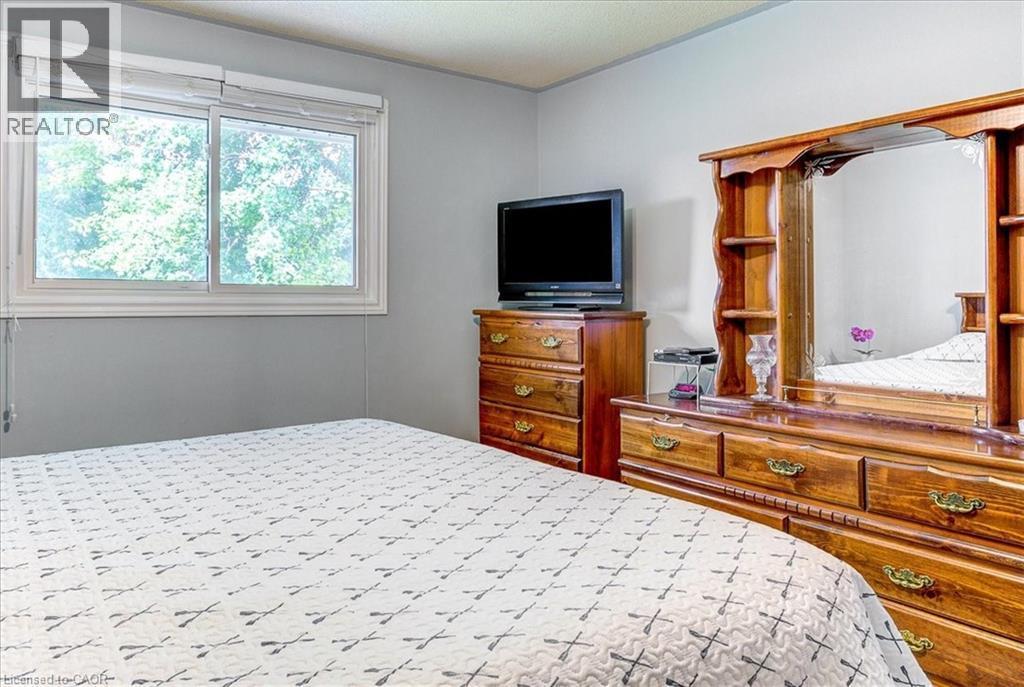 Bedroom 1 - 12 Miller Crescent, Simcoe, ON - Indoor Photo Showing Bedroom