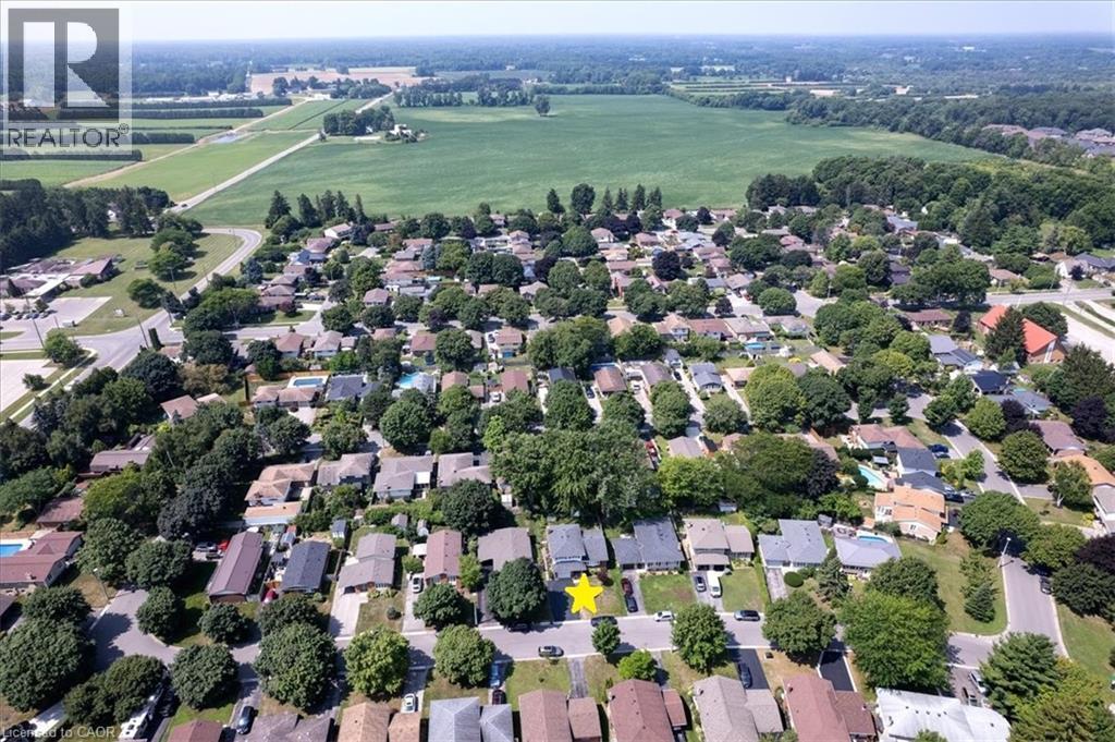 View looking west to the nearby farmland - 12 Miller Crescent, Simcoe, ON - Outdoor With View
