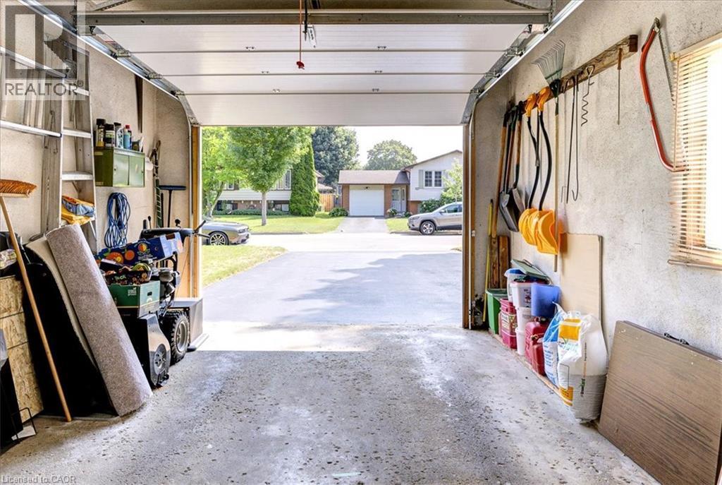 Keep the car out of the elements! - 12 Miller Crescent, Simcoe, ON - Indoor Photo Showing Garage