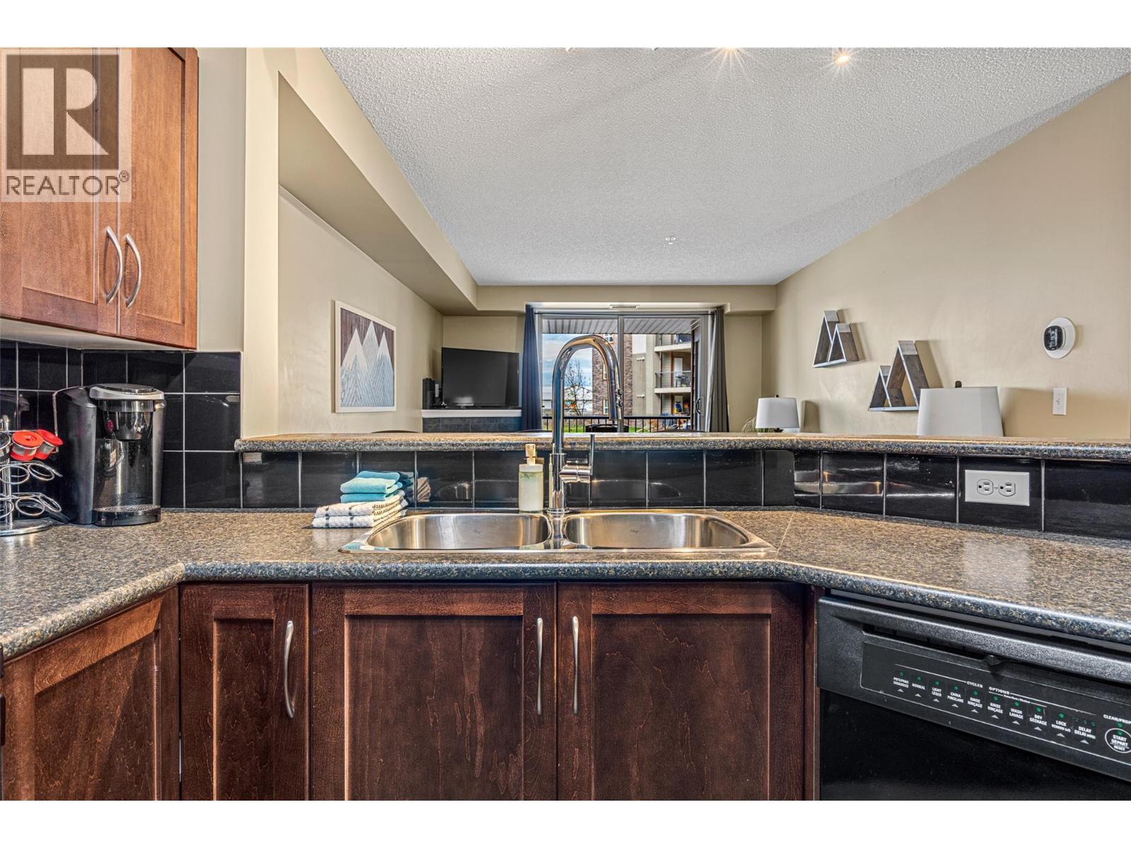 205 Third Avenue Unit# 1102, Invermere, BC - Indoor Photo Showing Kitchen With Double Sink