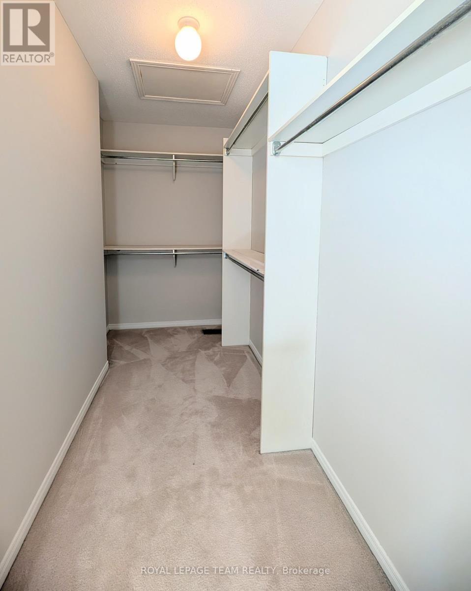 Primary walk in closet - 90 Moresby Drive, Ottawa, ON - Indoor Photo Showing Living Room