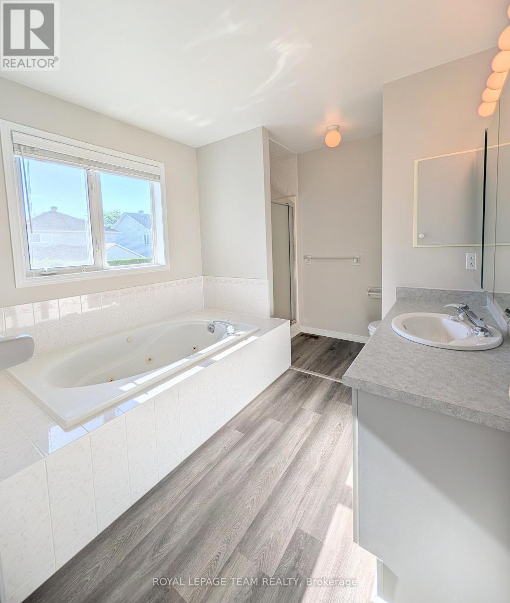 Primary En suite bath - updated flooring and paint - 90 Moresby Drive, Ottawa, ON - Indoor Photo Showing Living Room