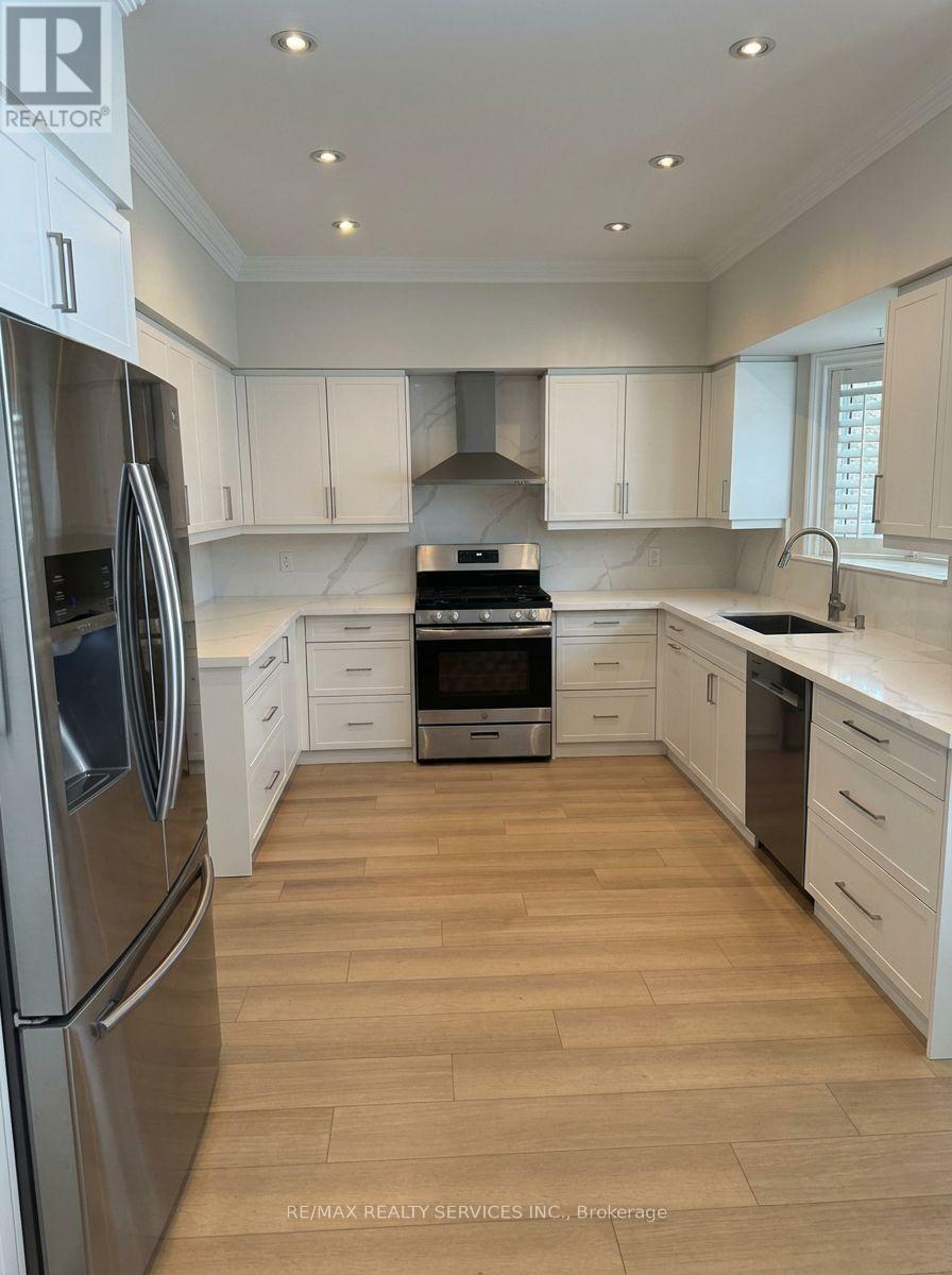 Kitchen has stainless steel appliances - 2432 Marisa Court, Mississauga, ON - Indoor Photo Showing Kitchen With Stainless Steel Kitchen