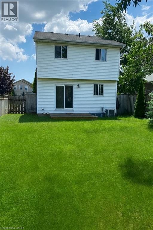 Rear view of house featuring a fenced backyard - 988 Prosperity Court, London, ON - Outdoor
