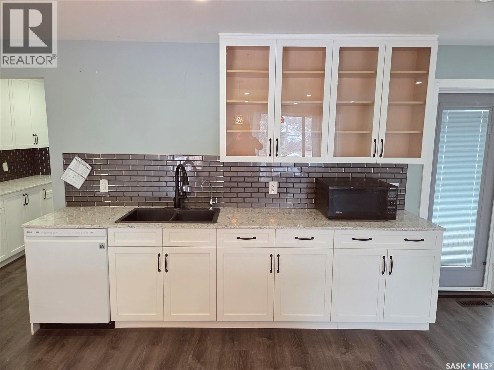 621 Mccall Street, Oxbow, SK - Indoor Photo Showing Kitchen With Double Sink
