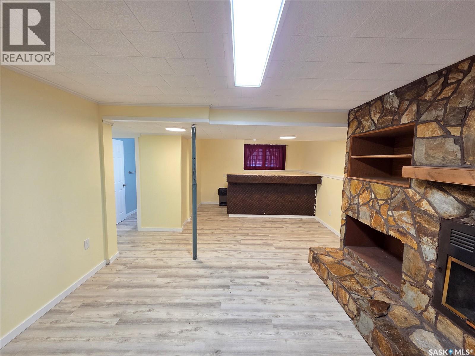 621 Mccall Street, Oxbow, SK - Indoor Photo Showing Other Room With Fireplace