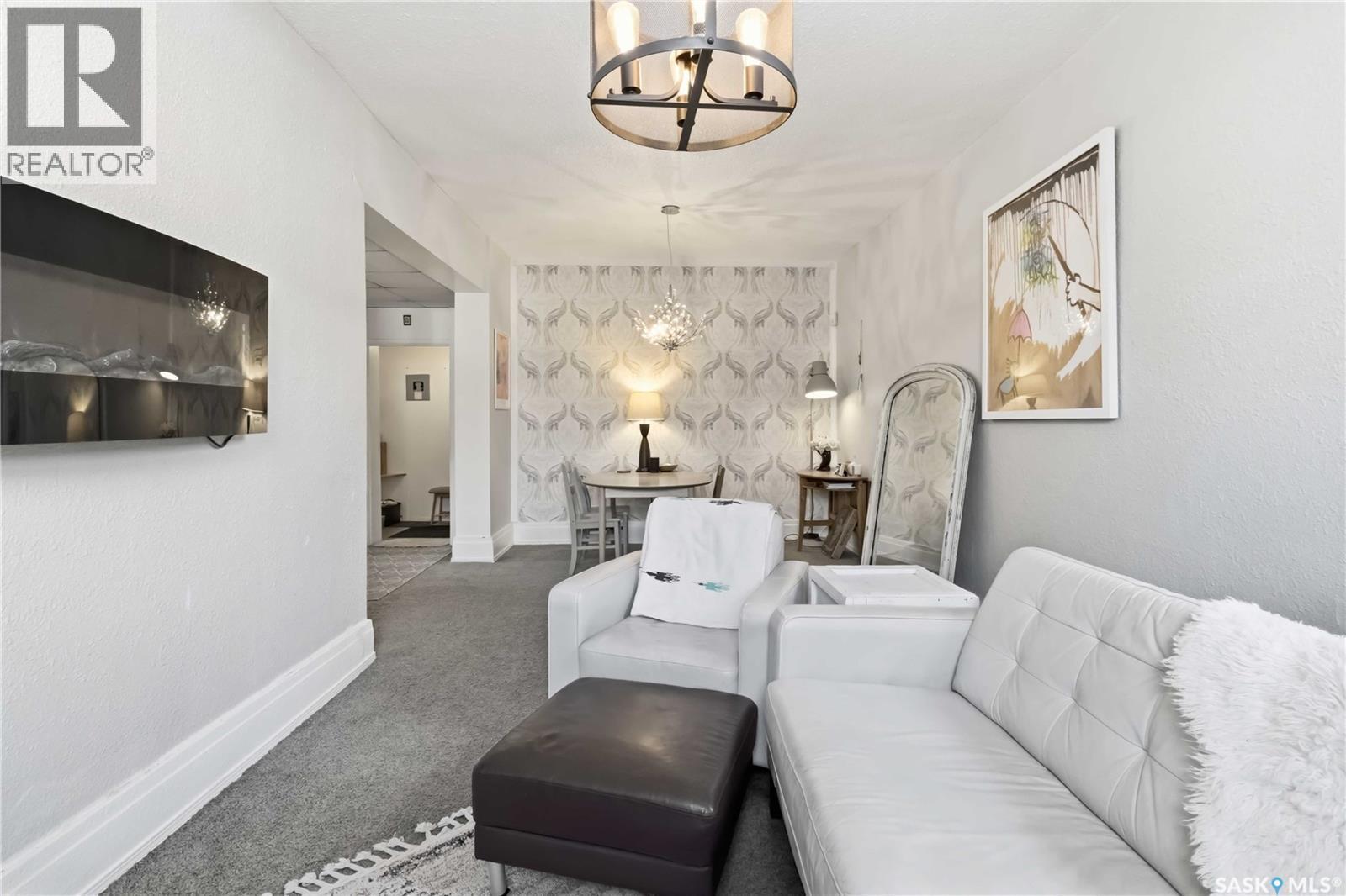 103 609 King Street, Saskatoon, SK - Indoor Photo Showing Living Room