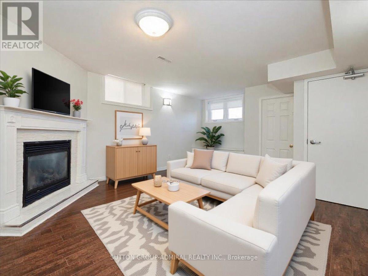 64 Copeman Crescent, Barrie, ON - Indoor Photo Showing Living Room With Fireplace