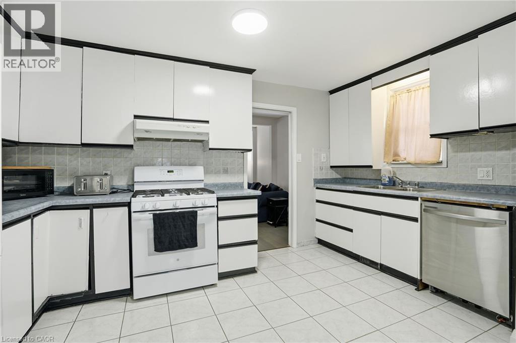 4 Hilda Street, St. Catharines, ON - Indoor Photo Showing Kitchen With Double Sink