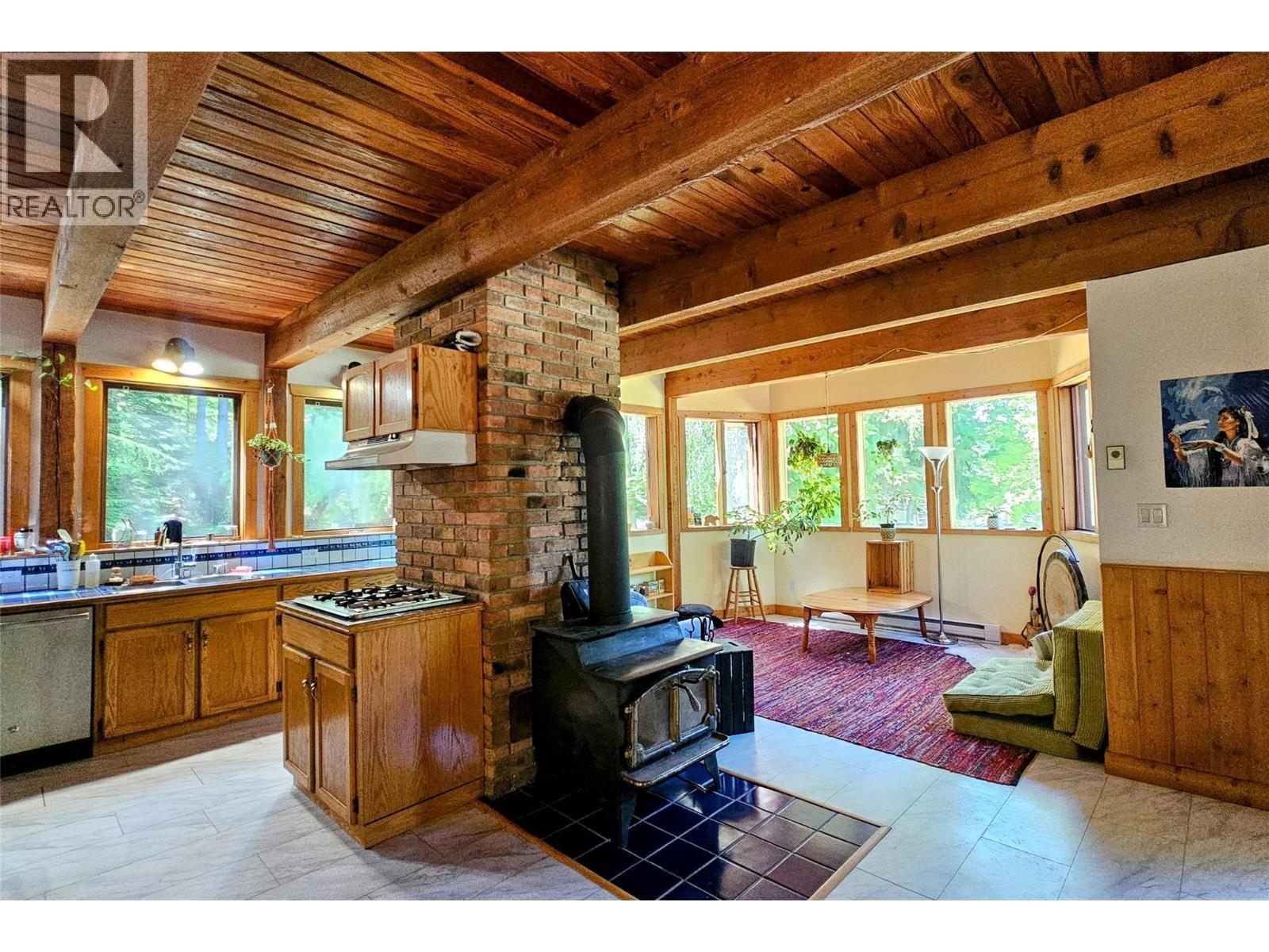 8496 B Procter Road E, Procter, BC - Indoor Photo Showing Kitchen With Double Sink