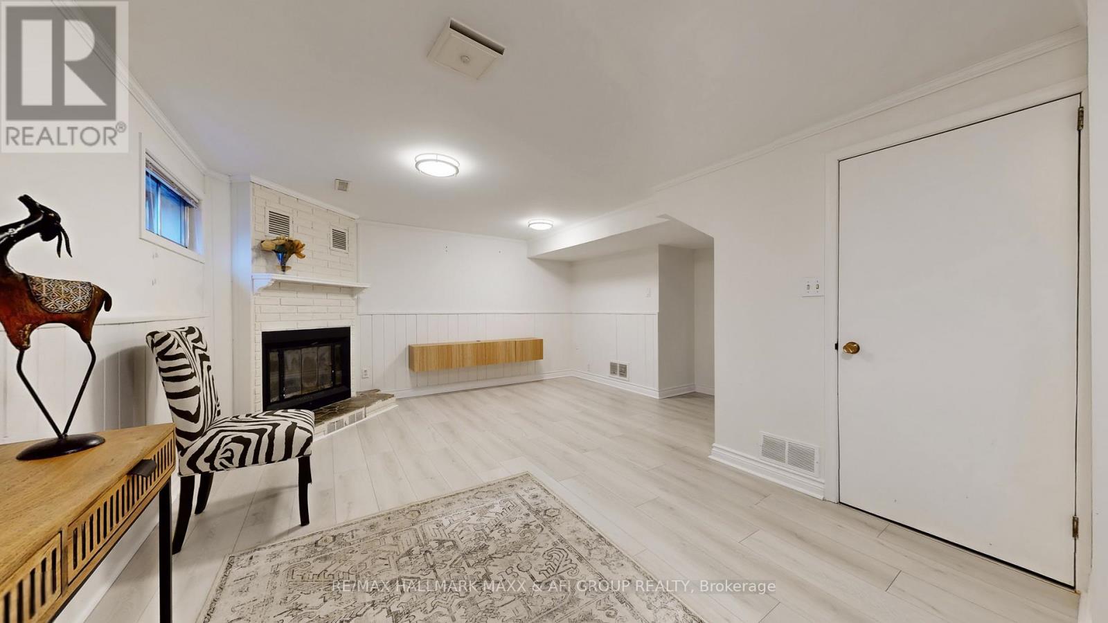42 Devins Drive, Aurora, ON - Indoor Photo Showing Other Room With Fireplace