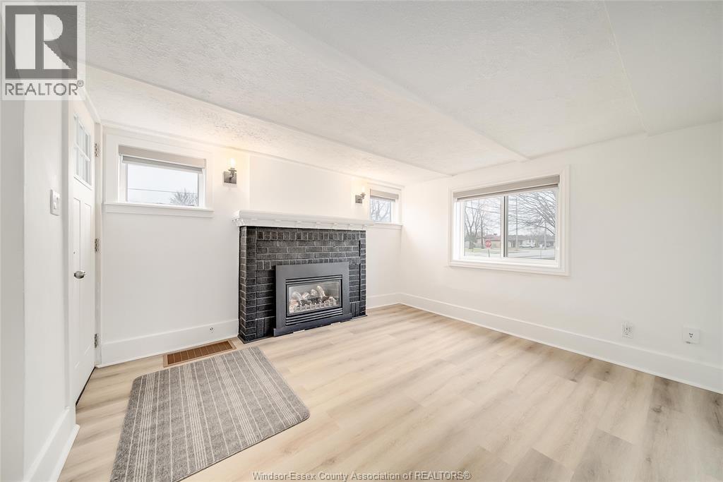 1985 Lesperance, Tecumseh, ON - Indoor Photo Showing Living Room With Fireplace