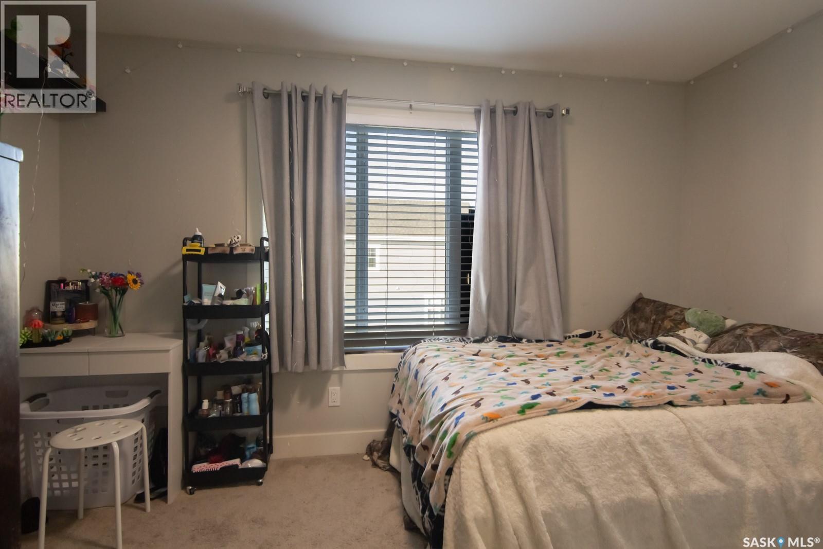 709 Meadows Boulevard, Saskatoon, SK - Indoor Photo Showing Bedroom