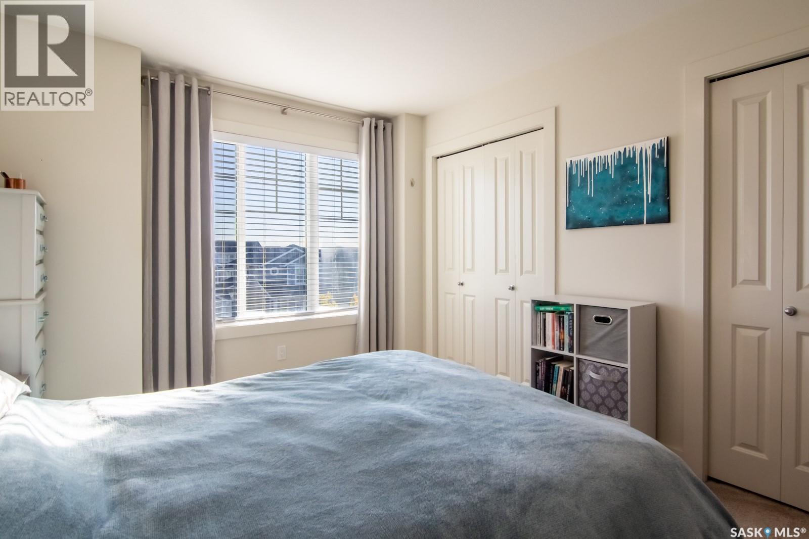 709 Meadows Boulevard, Saskatoon, SK - Indoor Photo Showing Bedroom