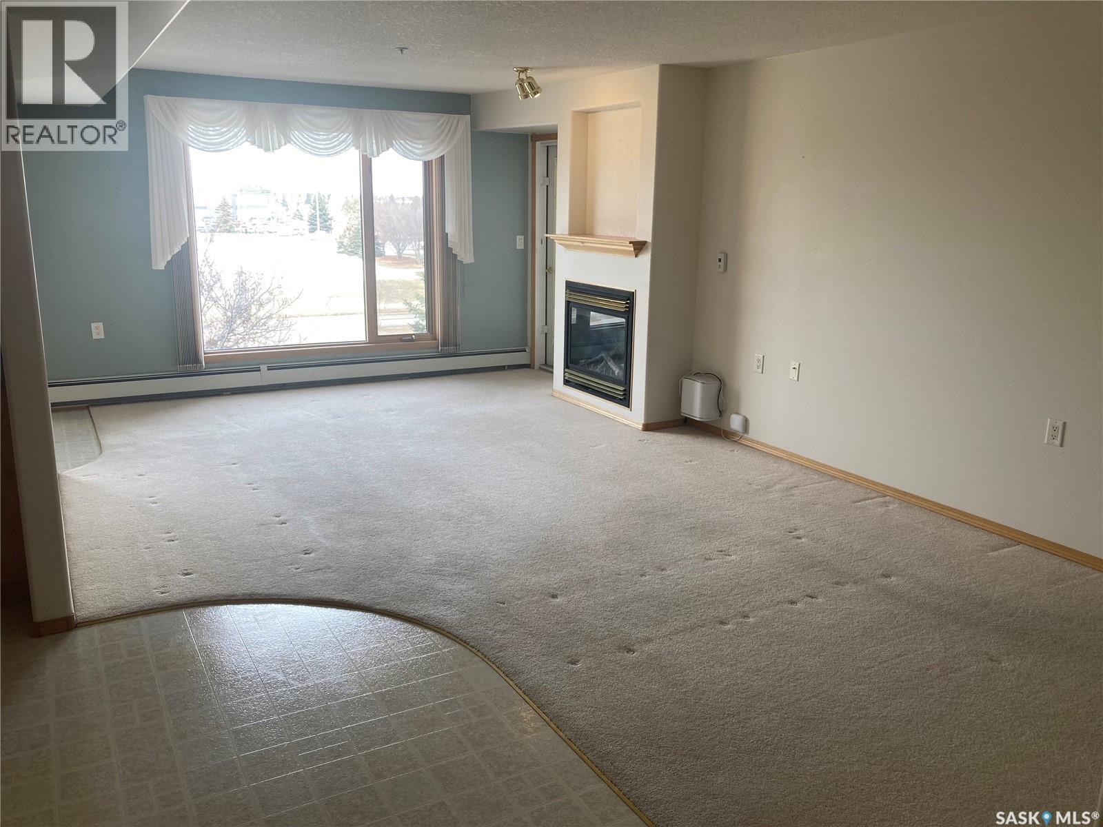 329 325 Keevil Crescent, Saskatoon, SK - Indoor With Fireplace