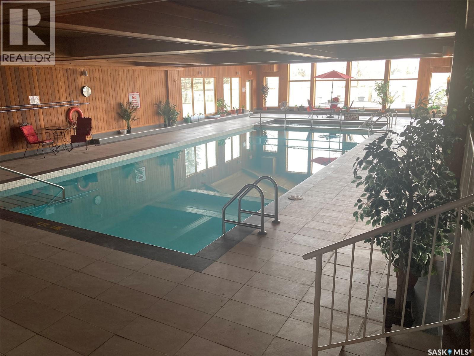 329 325 Keevil Crescent, Saskatoon, SK - Indoor Photo Showing Other Room With In Ground Pool