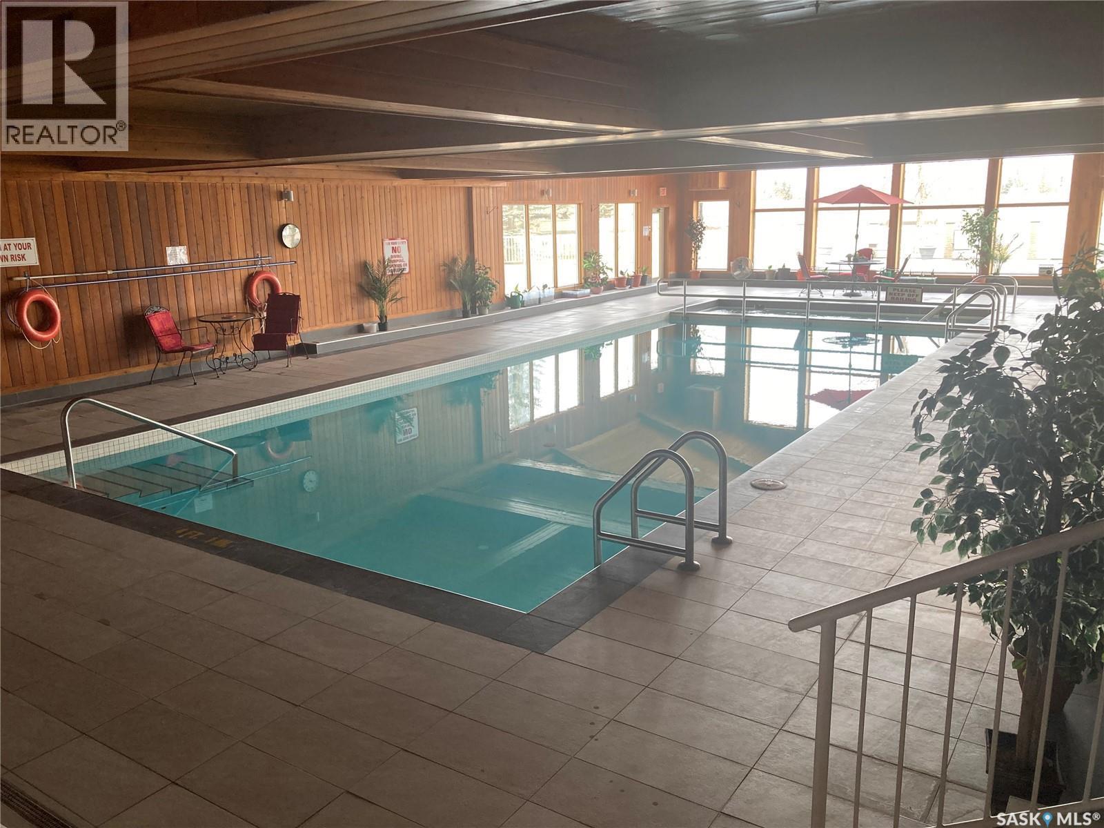 329 325 Keevil Crescent, Saskatoon, SK - Indoor Photo Showing Other Room With In Ground Pool