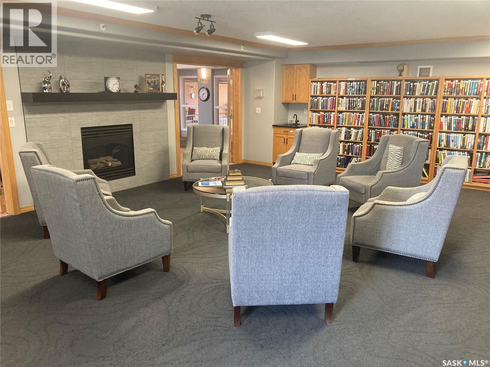 329 325 Keevil Crescent, Saskatoon, SK - Indoor Photo Showing Living Room With Fireplace