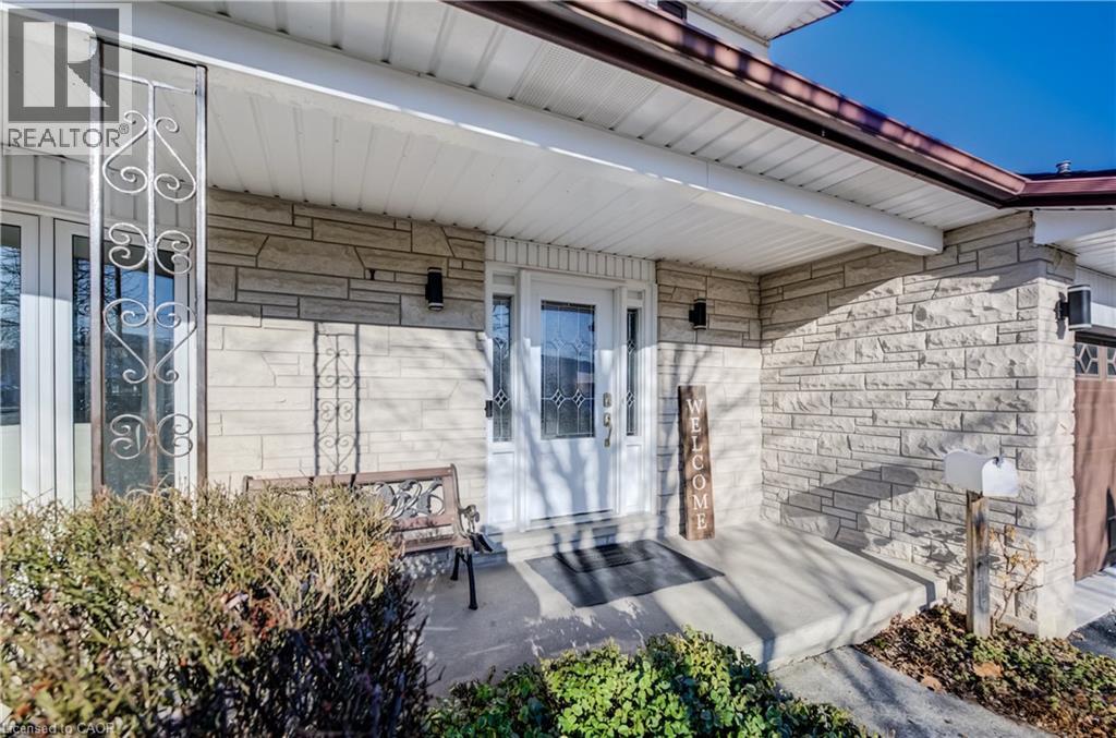 Large front porch with newer entry door system. - 63 Kingston Crescent, Kitchener, ON - Outdoor