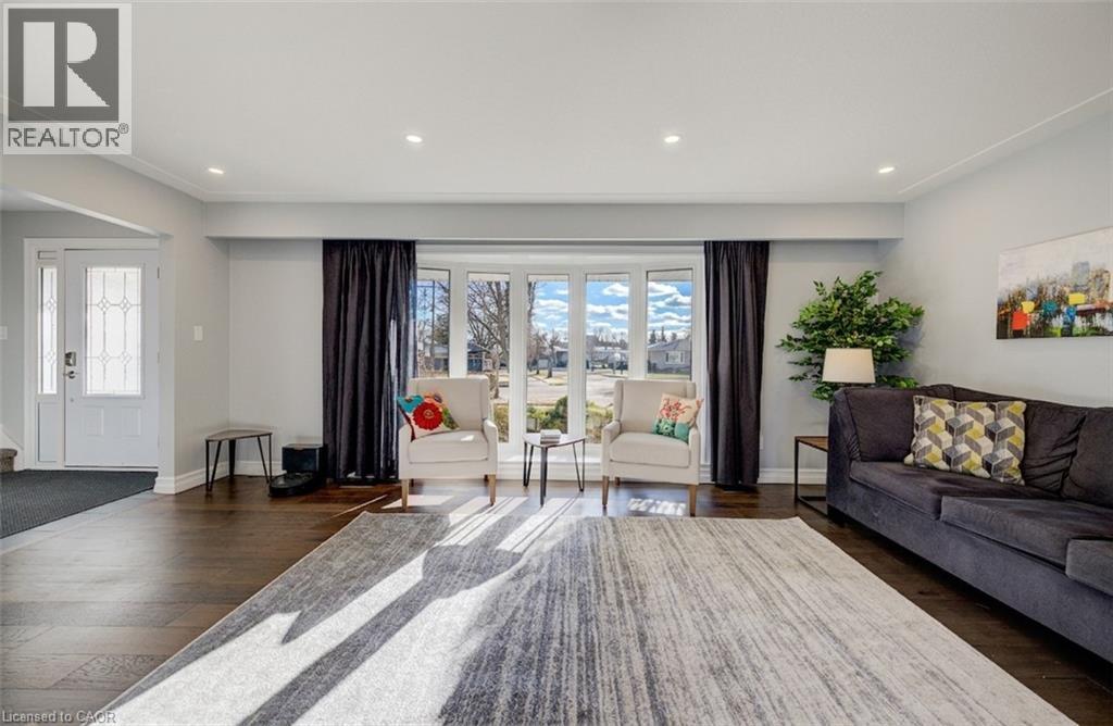 What a great window for natural light. - 63 Kingston Crescent, Kitchener, ON - Indoor Photo Showing Living Room