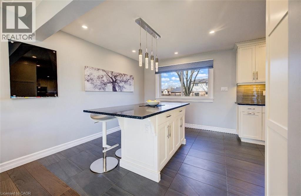 Beautiful and functional island/breakfast bar. - 63 Kingston Crescent, Kitchener, ON - Indoor Photo Showing Kitchen