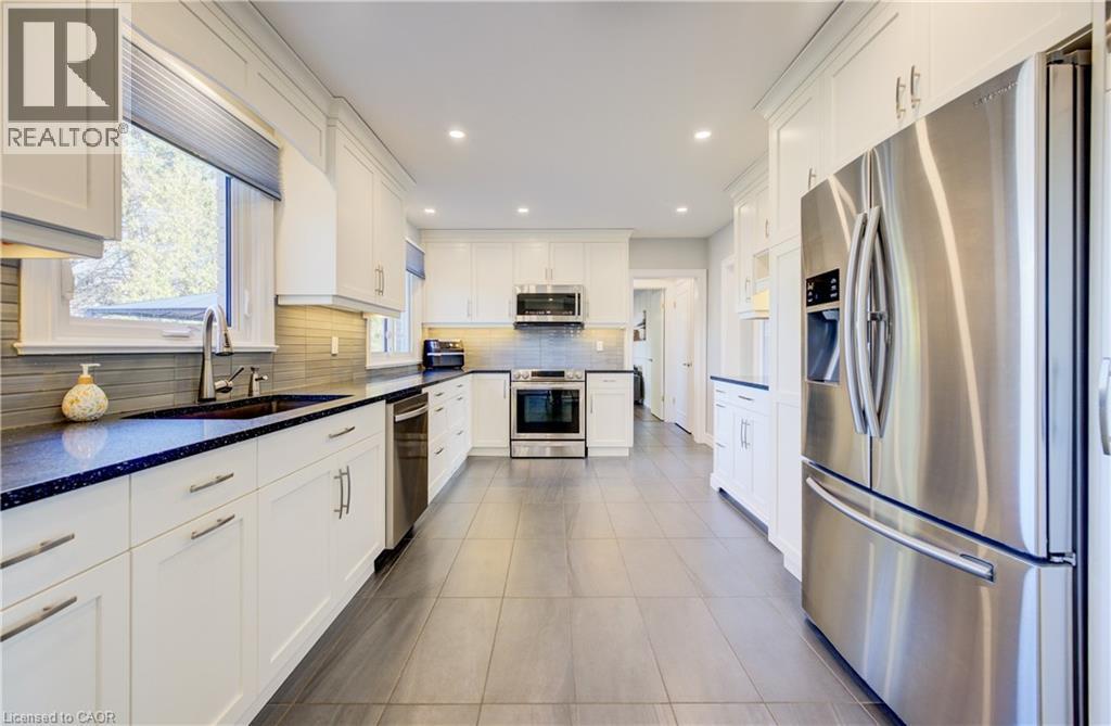 Under-cabinet lighting. - 63 Kingston Crescent, Kitchener, ON - Indoor Photo Showing Kitchen With Upgraded Kitchen