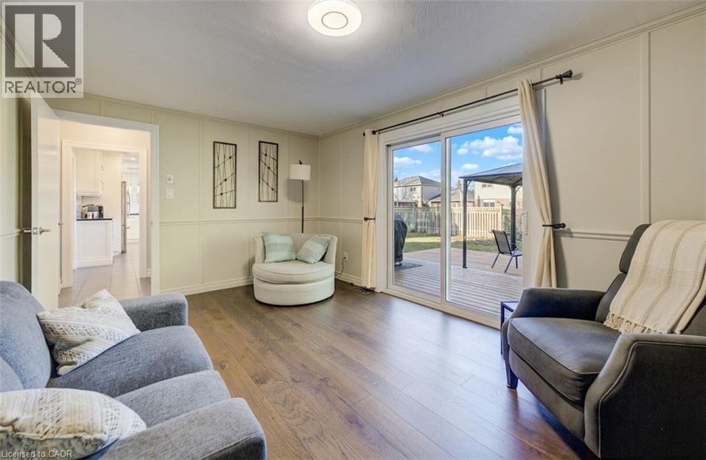 Sliders to huge deck. - 63 Kingston Crescent, Kitchener, ON - Indoor Photo Showing Living Room