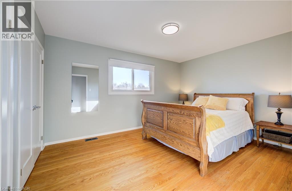 Primary bedroom with generous closet space. - 63 Kingston Crescent, Kitchener, ON - Indoor Photo Showing Bedroom